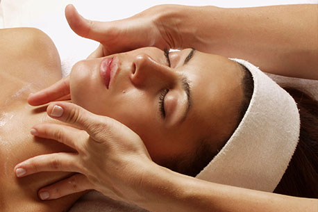 Makana Esthetics Wellness Academy Spa Services facial massage performed as part of hands-on esthetics training in a professional student spa environment