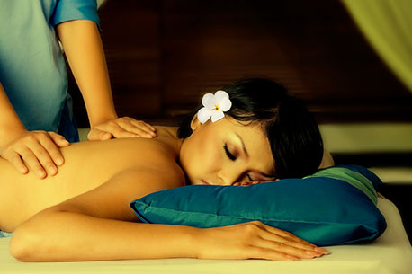 Makana Esthetics Wellness Academy Spa Services massage therapy treatment performed in a calm student spa setting during hands-on wellness training